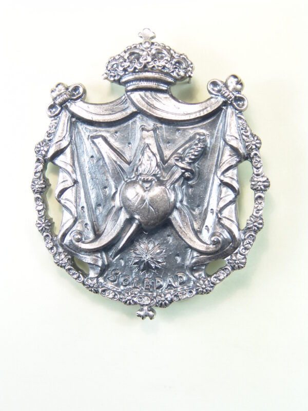 MEDALLAS RELIGIOSAS HERÁLDICAS RELIEVE "CORAZON ATRVESADO POR UN PUÑAL DE DOLOR SOBRE AVE MARIA CON DOCEL Y TOISON 70 MM"