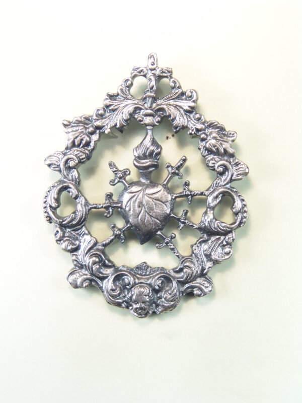 MEDALLAS RELIGIOSAS HERÁLDICAS RELIEVE "CORAZON CON 7 PUÑALES ORLADO DE HOJAS DE ACANTO 70 MM"